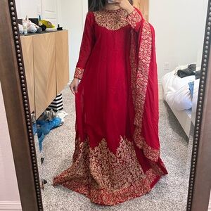 Red long kurta with shalwar and dupatta